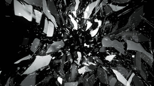 istock Pieces of splitted or broken glass on black 1015855672