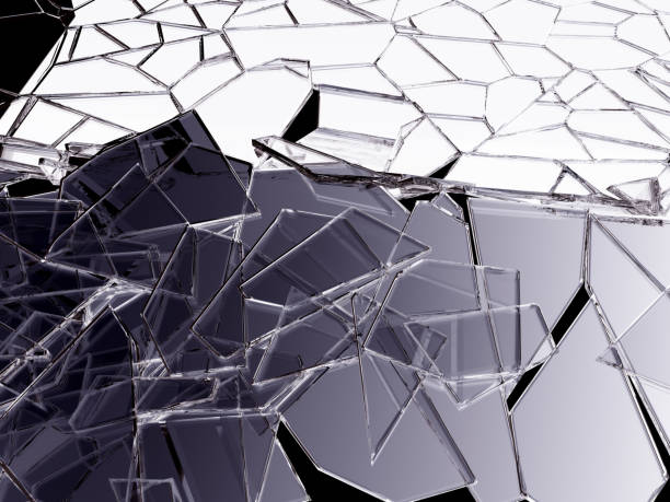 istock Pieces of broken or cracked glass on white 1015855956