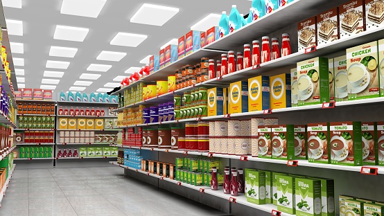 Supermarket interior with shelves full of various products.