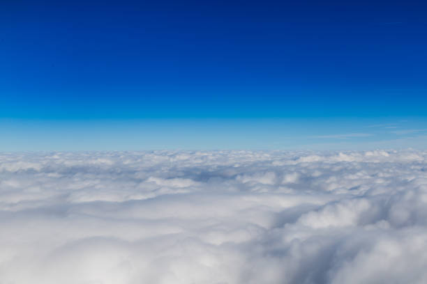 istock Blue horizon and white clouds, aerial shot 1015859272