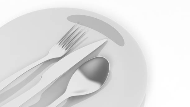 istock Silver fork, spoon and knife with a plate, isolated on white background. 1015864112