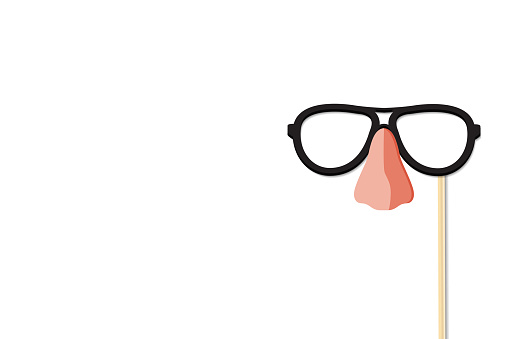 glasses and nose on a plastic stick are isolated on a white background. retro vintage art design.