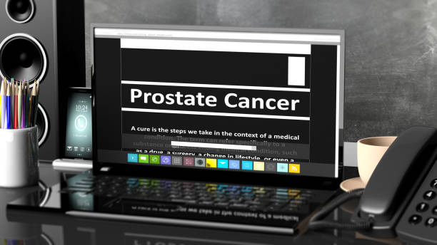 istock Laptop with Prostate Cancer information on screen, on desktop with office objects. 1015867520