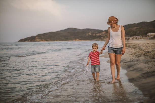 istock Mother and son at the beach 1015868418