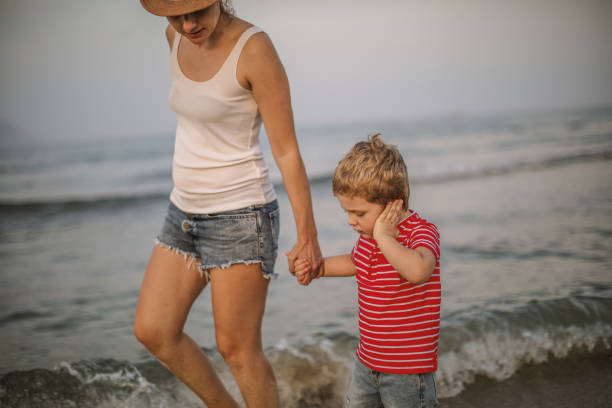 istock Mother and son at the beach 1015872052
