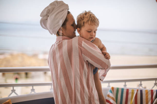 istock Mother and son on the balcony 1015874824