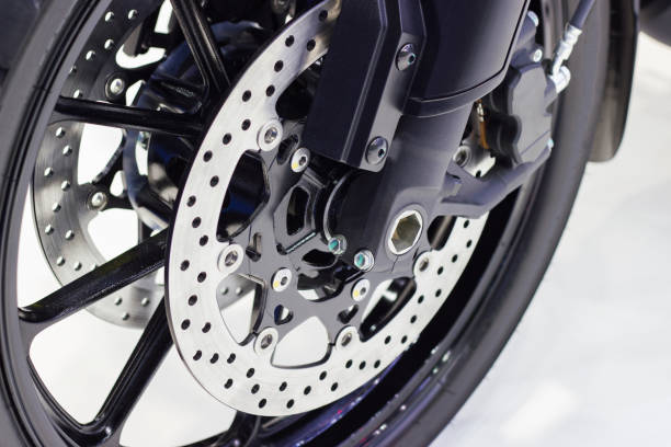 istock close up - wheel spokes and brake disc of a motorcycle 1015886878