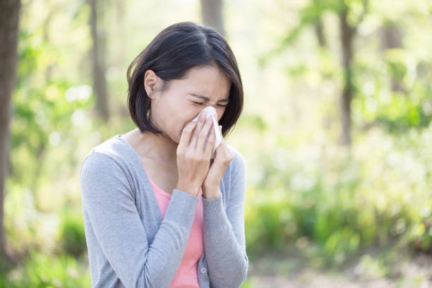 istock woman with sick in winter 1015891502