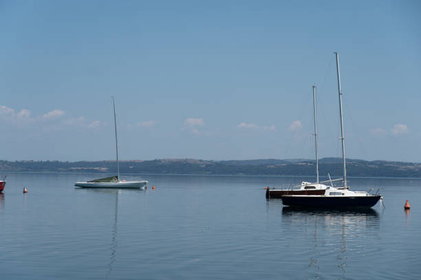 istock Small boats on Bracciano lake 1015895914