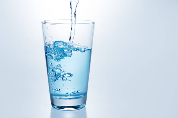 istock Beautiful splash of blue water 1015906788