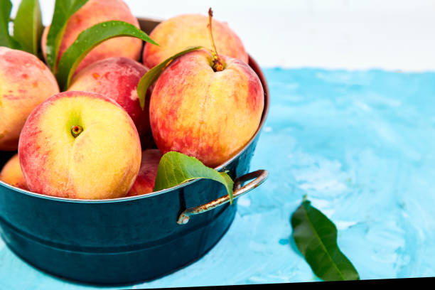 istock Ripe peaches in a bowl 1015909192
