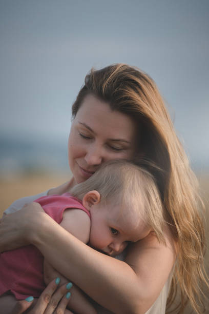 istock mother love. embracing. calm 1015909854