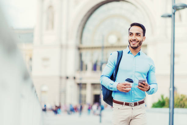 istock Colombian businessman using mobile phone 1015909932