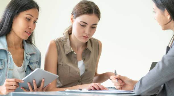 istock Multicultural businesswomen in group meeting. 1015927634
