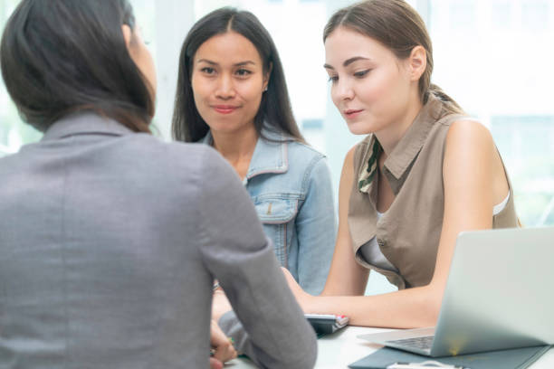 istock Multicultural businesswomen in group meeting. 1015927684