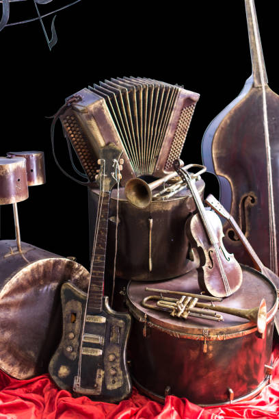 istock Old vintage musical instruments on a black background. Classical music instrument 1015928190