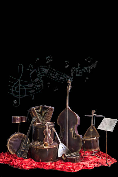 istock Old vintage musical instruments on a black background. Classical music instrument 1015928242