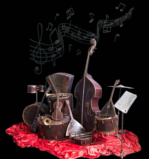 istock Old vintage musical instruments on a black background. Classical music instrument 1015928282