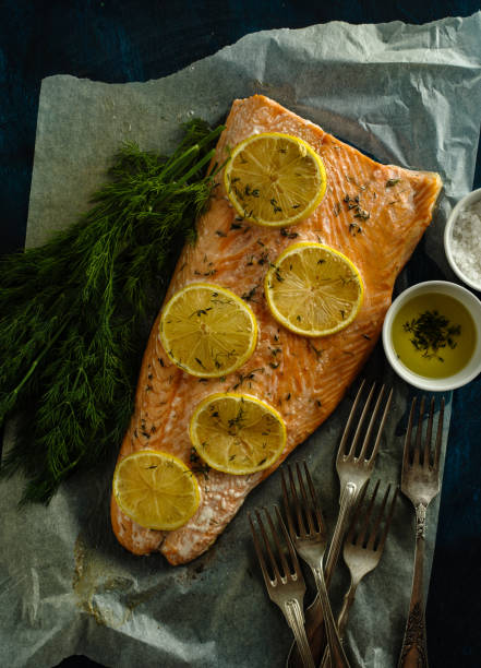 istock Fillet salmon fish Grill with lemon, thyme and dill. Top view 1015933164