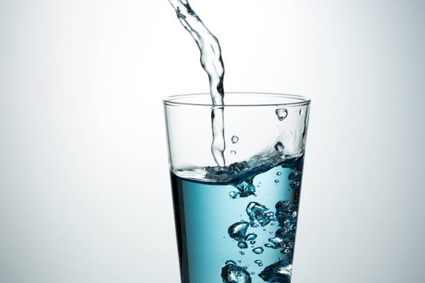 istock Beautiful splash of blue water 1015934008