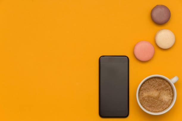 istock Coffee and French macaroons top view 1015934538