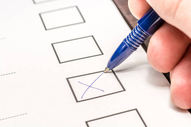 istock With a pen a cross is made to the vote 1015937332