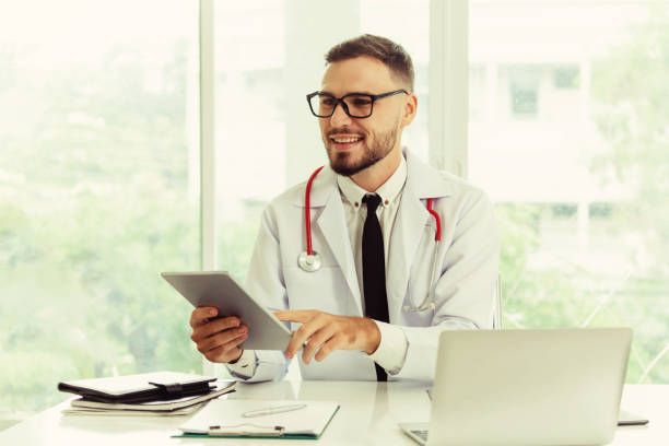 istock Doctor working on tablet computer in the hospital. 1015938586