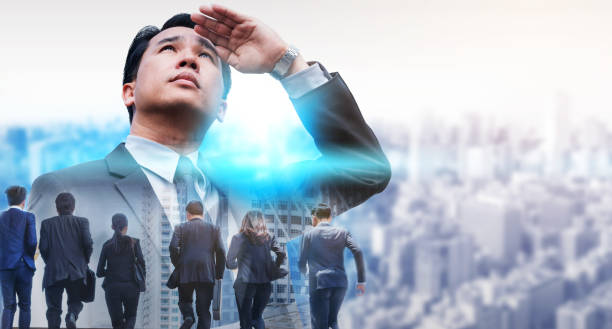 istock Double exposure - Business Leader and Team. 1015941448