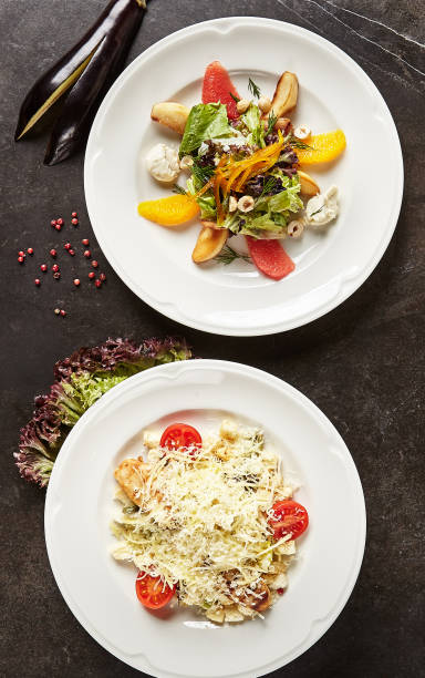 istock Salad Set with Fried Chicken and Caesar Salat Top View 1015942128