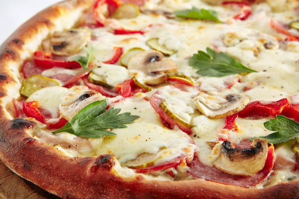 istock Creamy Pizza with Cervelat Isolated on White Background 1015942414