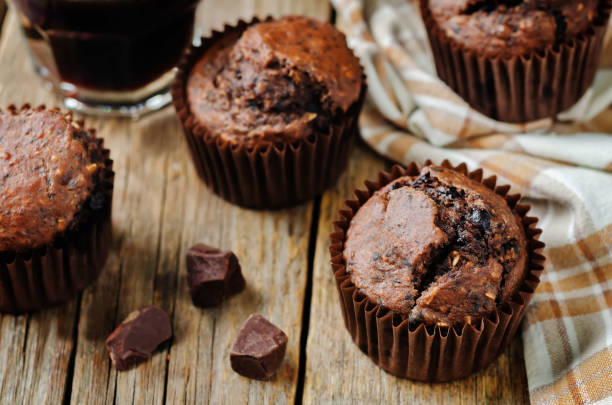 istock Chocolate chips oats chocolate muffins with coffee 1015943214