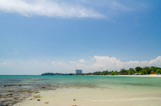 istock Beautiful nature, tropical beach with clear water and stones. 1015953210