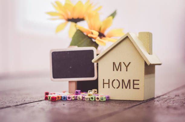 istock small wooden house and signage for text 1015953372