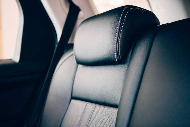 istock Car headrest leather upholstery detail 1015957828
