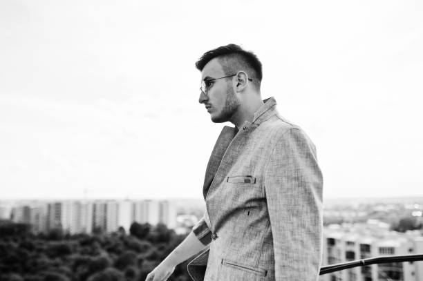 istock Dreamer stylish macho man in roof 1015958278