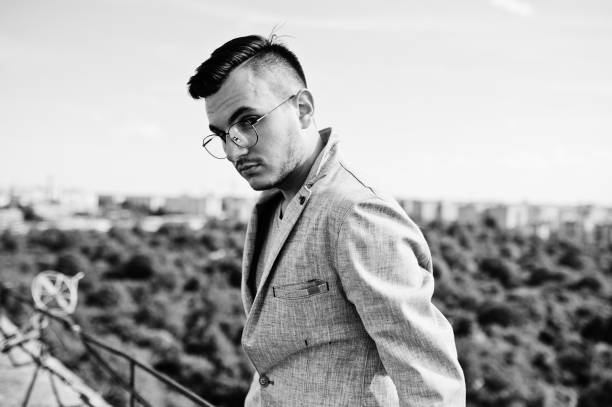 istock Dreamer stylish macho man in roof 1015958440