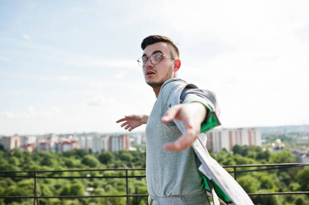 istock Dreamer stylish macho man in roof 1015958536