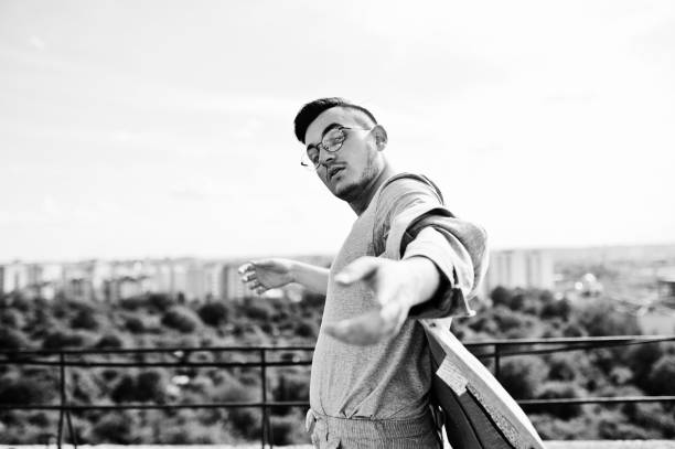 istock Dreamer stylish macho man in roof 1015958542