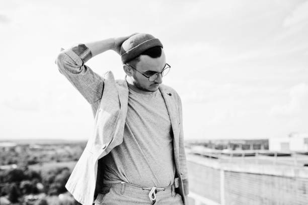 istock Dreamer stylish macho man in roof 1015958610