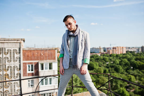 istock Dreamer stylish macho man in roof 1015958620