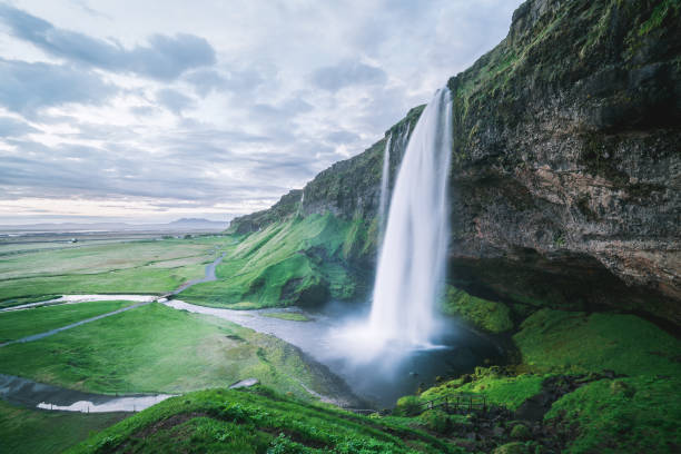 istock Seljalandsfoss - beautiful waterfall in Iceland 1015958628