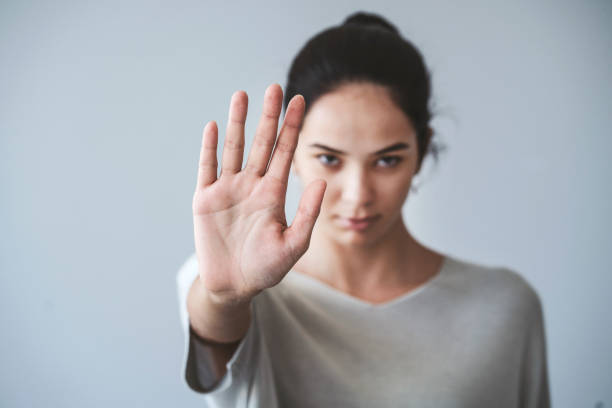 istock Young girl showing stop gesture 1015961628