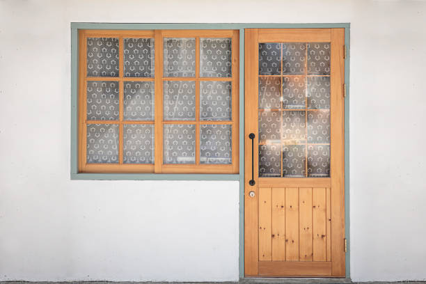 Vintage style window and door on white wall