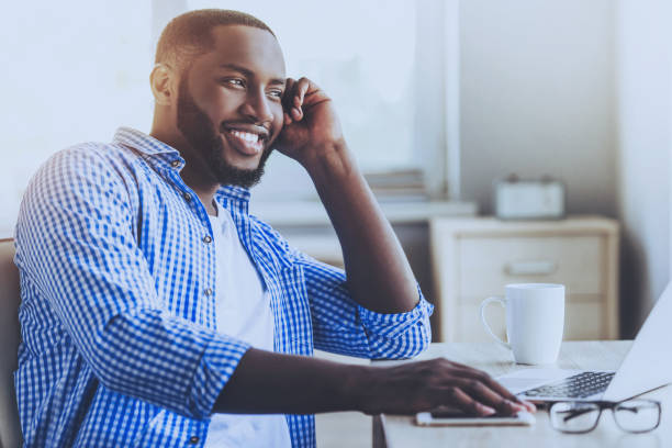istock Afro-american Young Man Sitting and Thinking. 1015989278