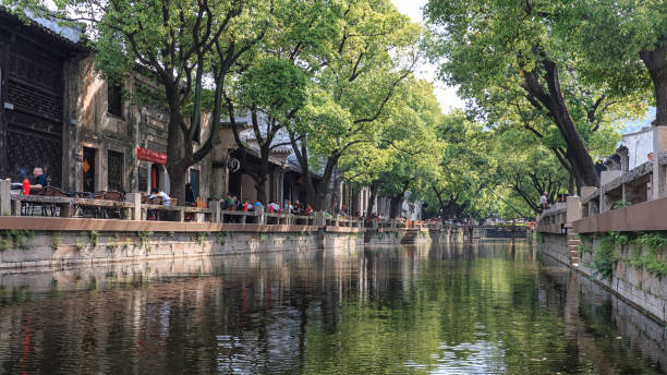 Water canal in Huishan old town in Jiangsu province, China Huishan, China - May 4, 2018: Water canal in Huishan old town in Jiangsu province, China grand canal china stock pictures, royalty-free photos & images