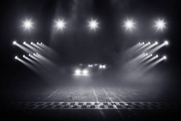 istock Race track finish line racing on night 1016005448
