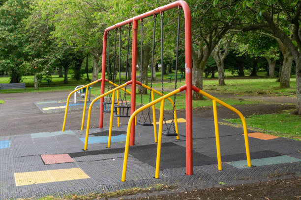 istock Colourful Children's Play Swings set in a Park 1016006070