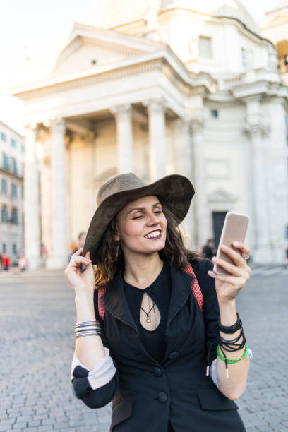 istock Smiling woman taking selfie 1016013588