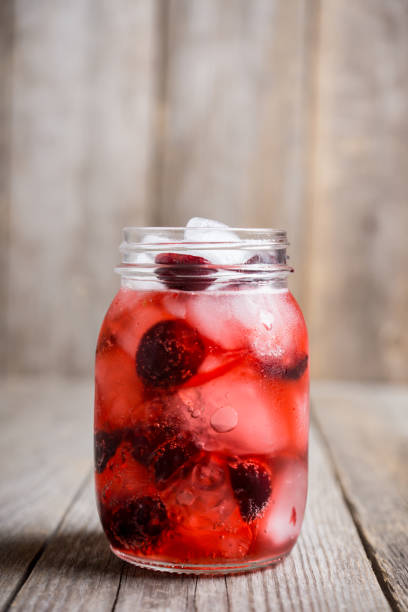 istock Cherry cocktail with ice in glass jar 1016020910