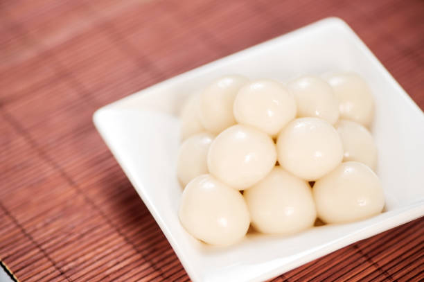 istock Japanese Dango dessert with 3 different color in pink(red), white, and green, recipe, hanami Dango, tsukimi Dango, copy space. 1016021038